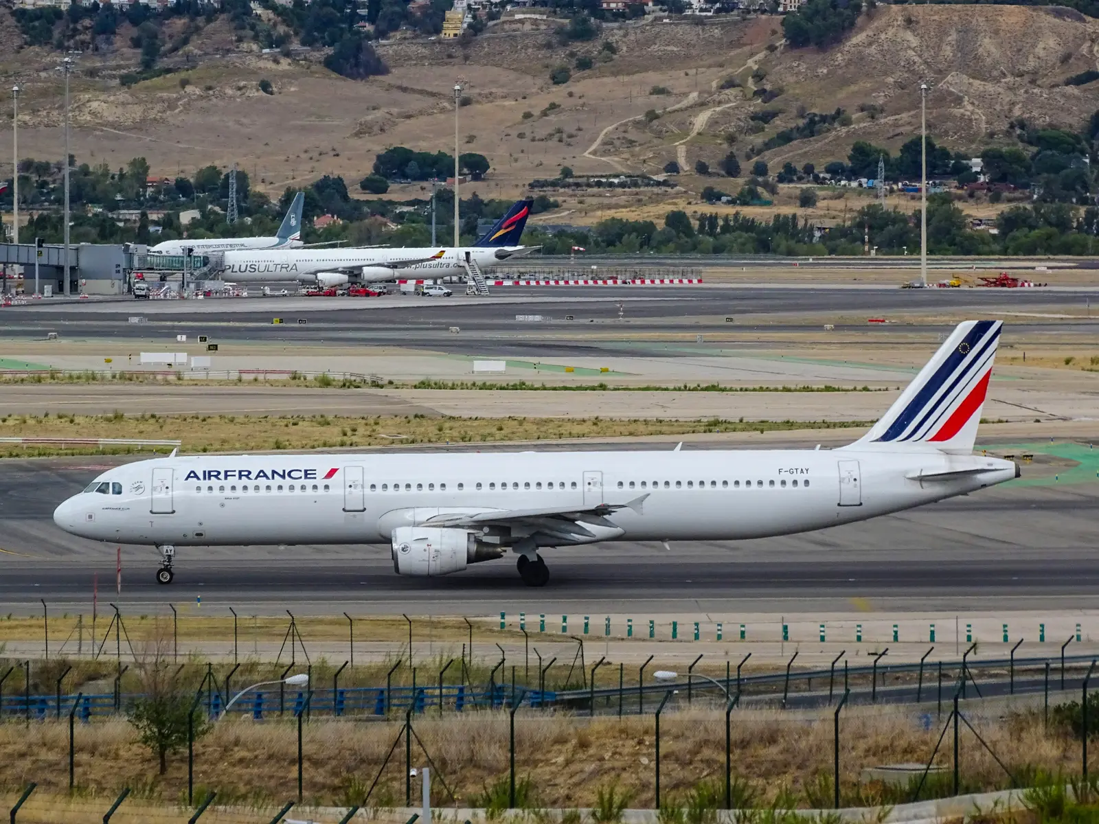 An Air France Airbus A321, registration F-GTAY, taxiing with the airline name on the fuselage and a striped tail.